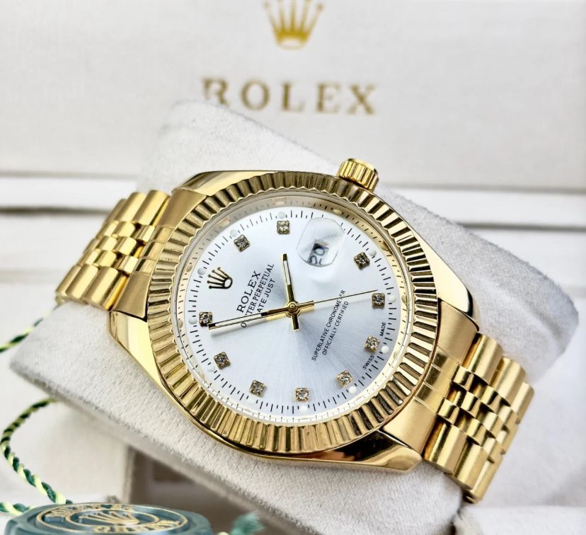 Rolex President dorado fondo blanco reloj mujer elegante oro